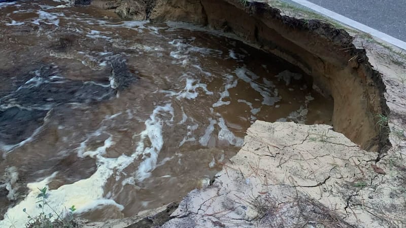 Lynin Parts of Pine Log Road washed out in Bay County