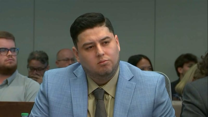 In this frame grab from video, Miguel Salguero Olivares, who is on trial for the murder and...