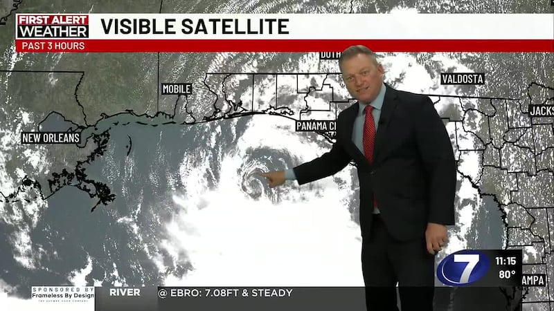 Chief Meteorologist Ryan Michaels showing Bertha's exposed center of circulation on visible...